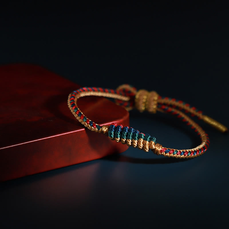 Bracelet de protection tibétain fait main en fil rouge