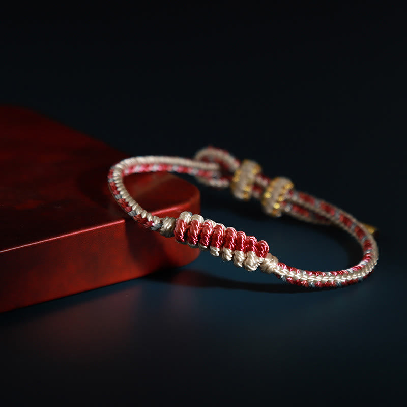 Bracelet de protection tibétain fait main en fil rouge