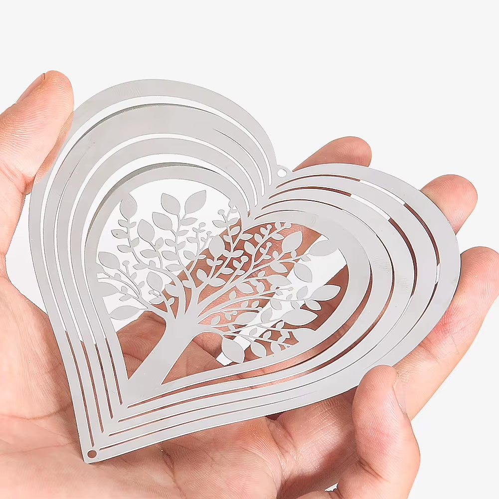 White paper-cut heart design with delicate tree pattern on Heart Tree of Life Wind Spinner