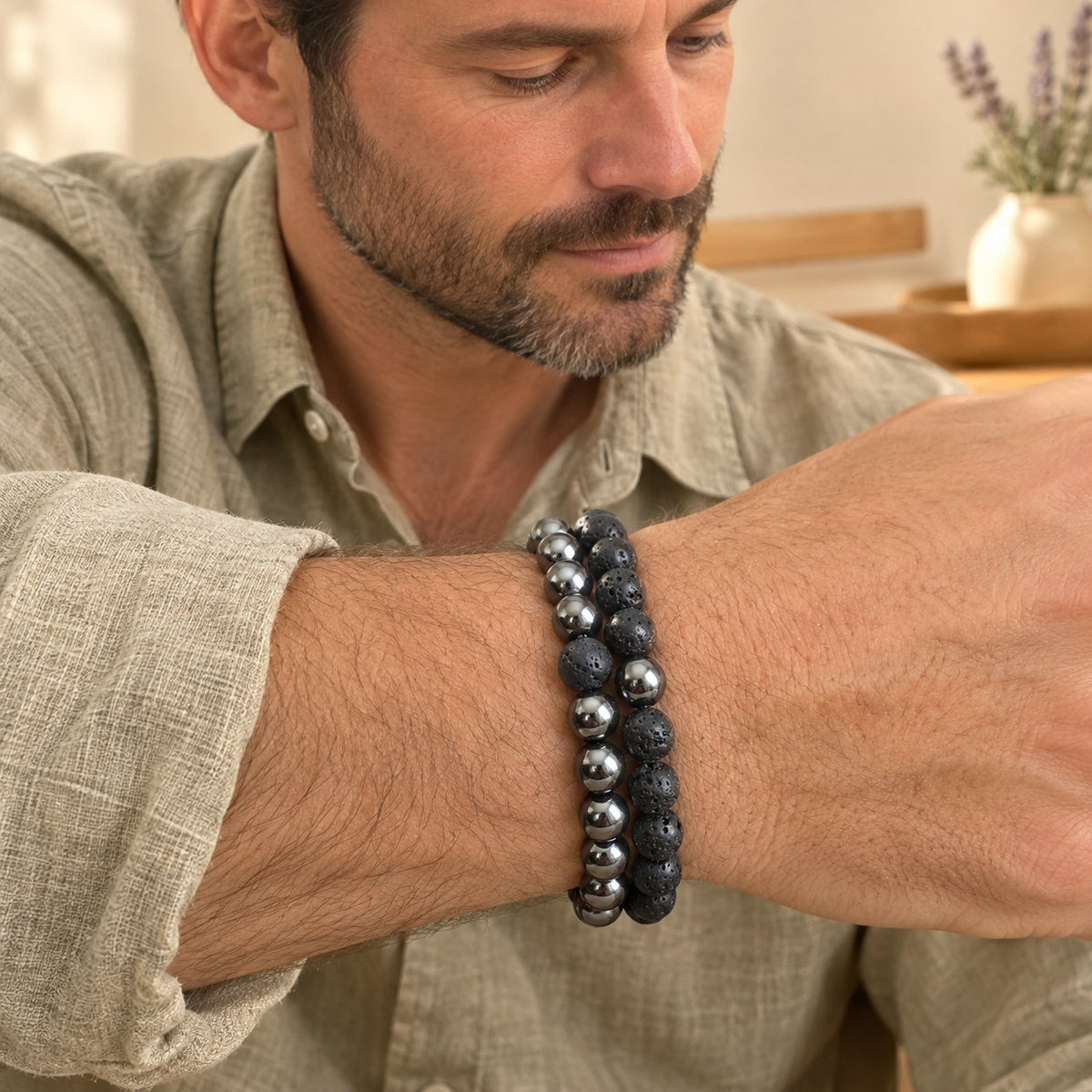 Hematite and Lava Stone Balance Bracelets, set worn on a wrist