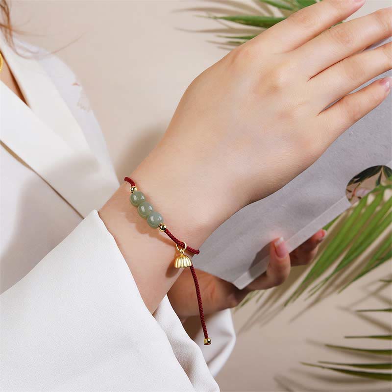 Bracelet en jade Hetian avec gousse de lotus pour la prospérité et la chance