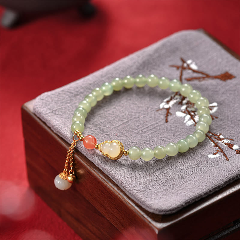 Bracelet porte-bonheur en jade Hetian et lotus en argent 925