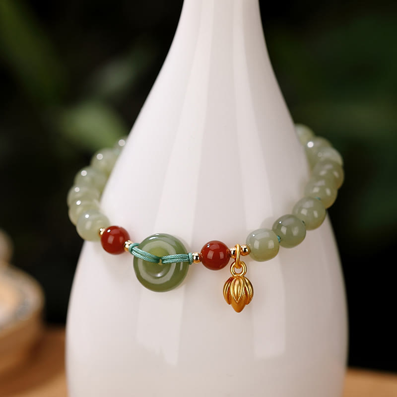 Bracelet porte-bonheur en jade Hetian 6 x 7 mm | Sons de guérison