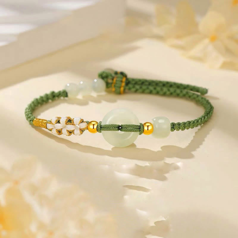 Bracelet tressé en jade Hetian avec boucle de paix et fleur de pêcher