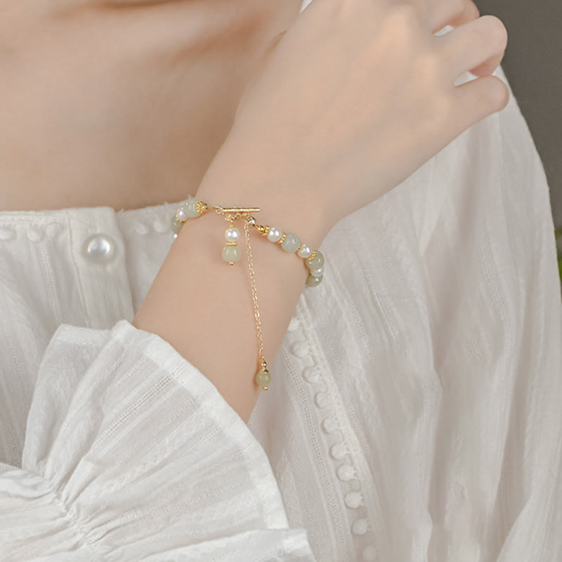 Bracelet d'abondance en perles de jade Hetian pour la prospérité et l'équilibre
