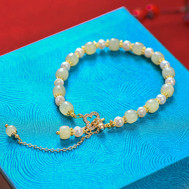Bracelet d'abondance en perles de jade Hetian pour la prospérité et l'équilibre