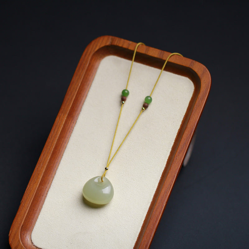 Collier pendentif prospérité en jade Hetian | Modèle petit sac
