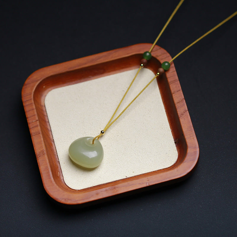 Collier pendentif prospérité en jade Hetian | Modèle petit sac