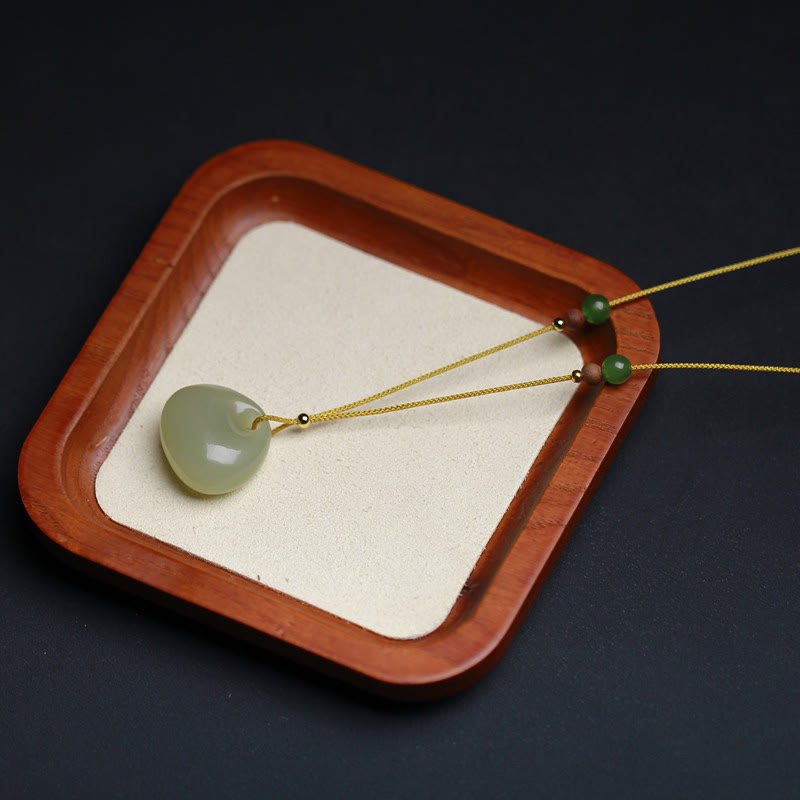 Collier pendentif prospérité en jade Hetian | Modèle petit sac