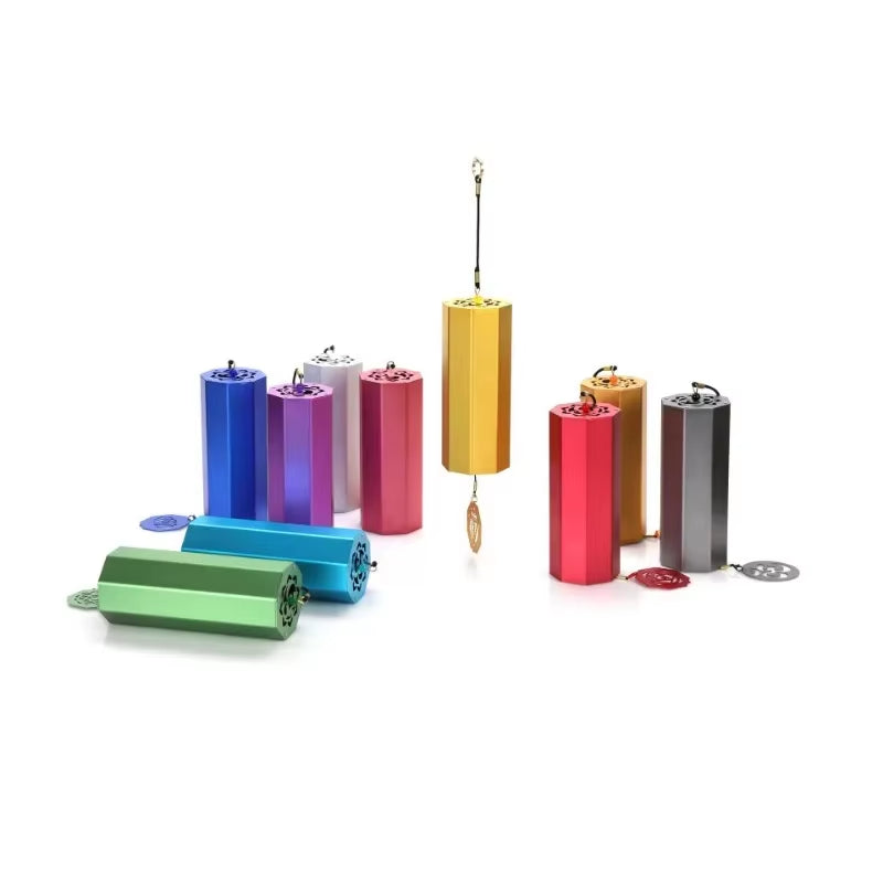 Colorful metal pill containers with keychain attachments for Hexagonal Metal Koshi Chime Bells