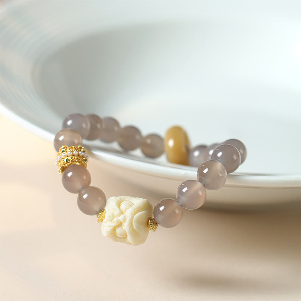 Bracelet en agate grise et ambre fruit ivoire pour la confiance