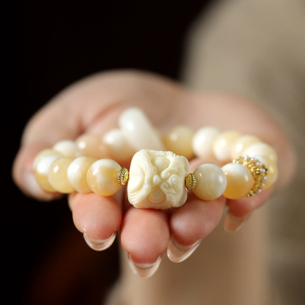 Bracelet en agate grise et ambre fruit ivoire pour la confiance