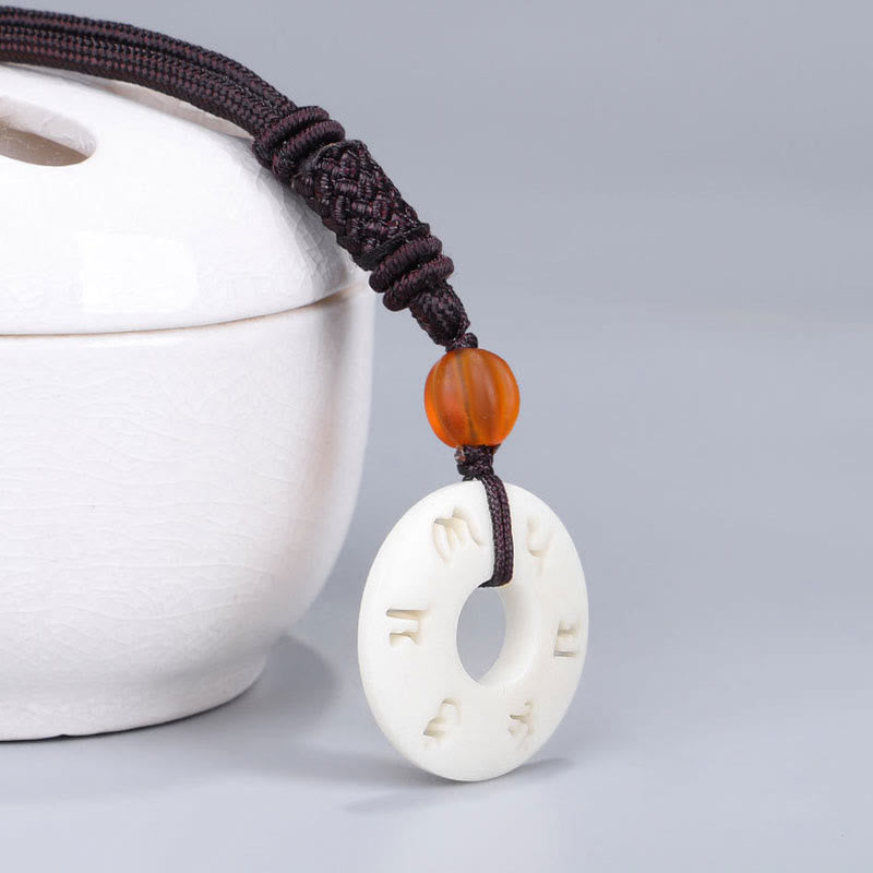 Collier de protection Om Mani Padme Hum en fruit ivoire 66 cm
