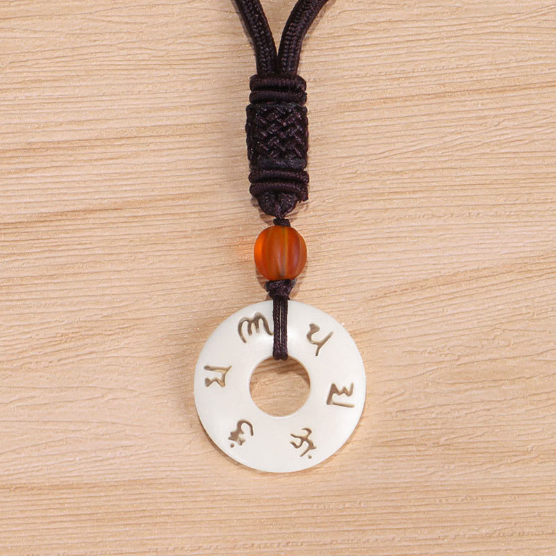 Collier de protection Om Mani Padme Hum en fruit ivoire 66 cm