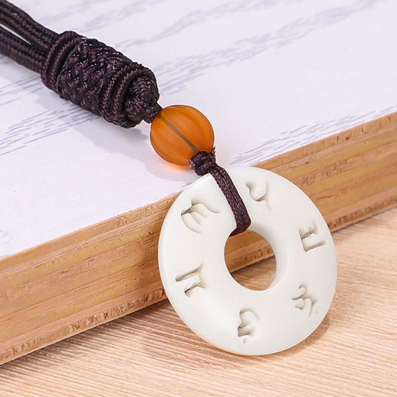 Collier de protection Om Mani Padme Hum en fruit ivoire 66 cm
