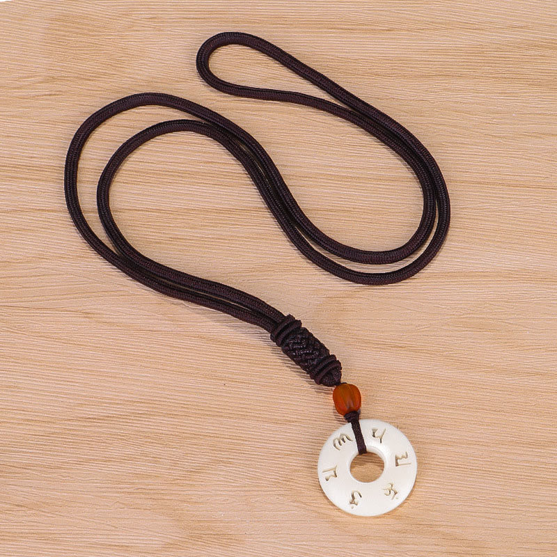 Collier de protection Om Mani Padme Hum en fruit ivoire 66 cm