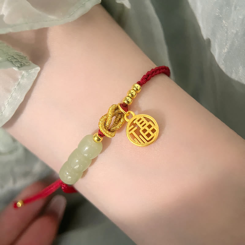 Bracelet en perles de jade avec breloque Fu sur corde rouge pour la chance et la prospérité