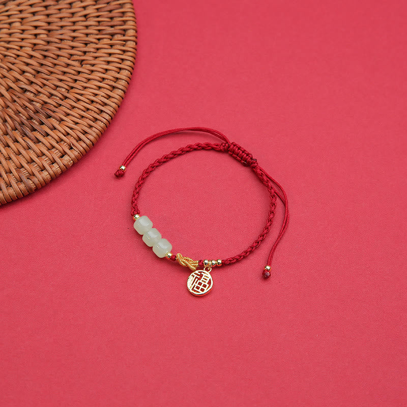 Bracelet en perles de jade avec breloque Fu sur corde rouge pour la chance et la prospérité