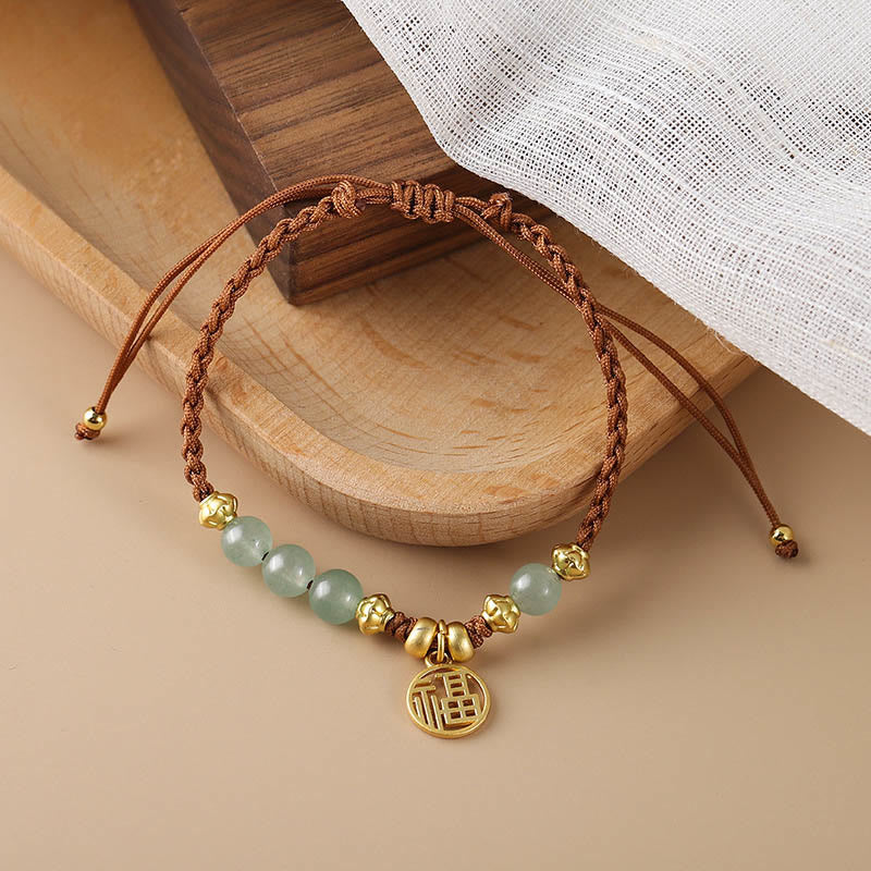 Bracelet en perles de jade avec le personnage Fu pour la prospérité et la chance
