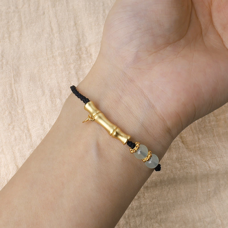 Bracelet Jade Luck Strength avec motif bambou et cordon rouge