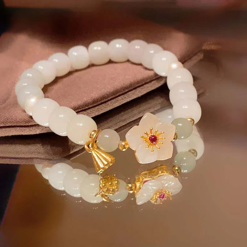 Bracelet porte-bonheur et bénédiction en perles de jade avec fleur de pêcher