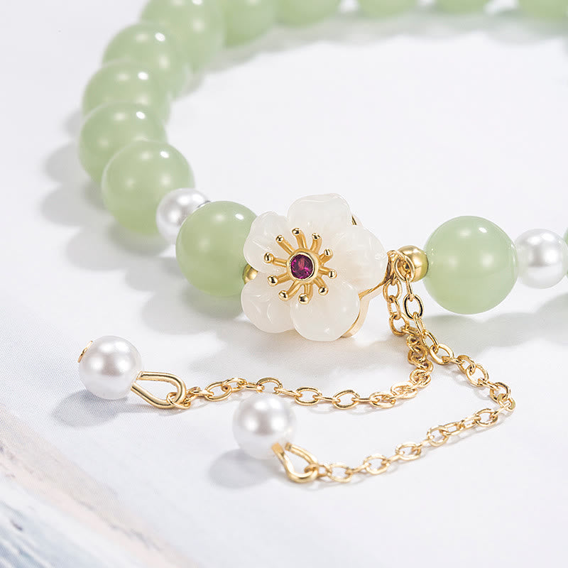 Bracelet porte-bonheur et bénédiction en perles de jade avec fleur de pêcher