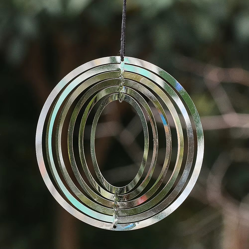 Metallic spiral wind spinner with circular rings for garden and yard decor