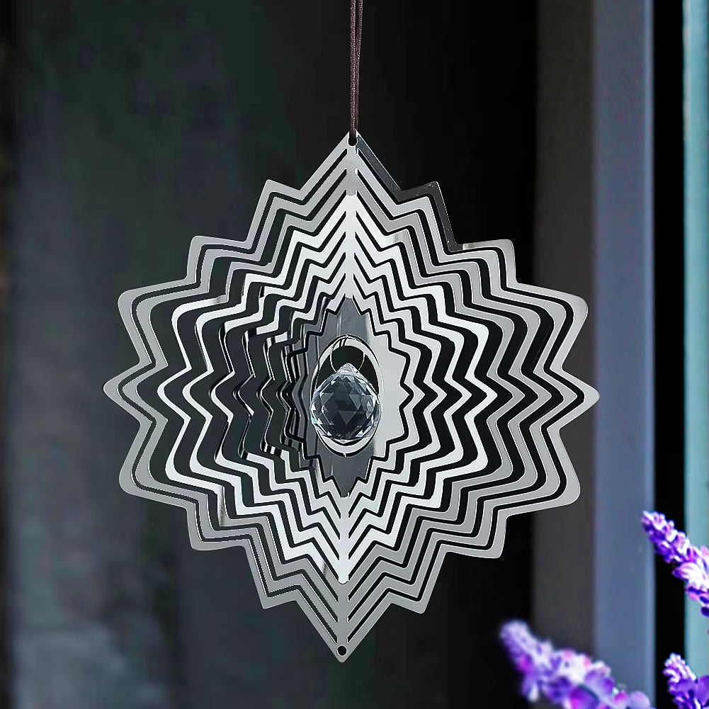 Metal wind spinner featuring a geometric star pattern and crystal accent for gardens