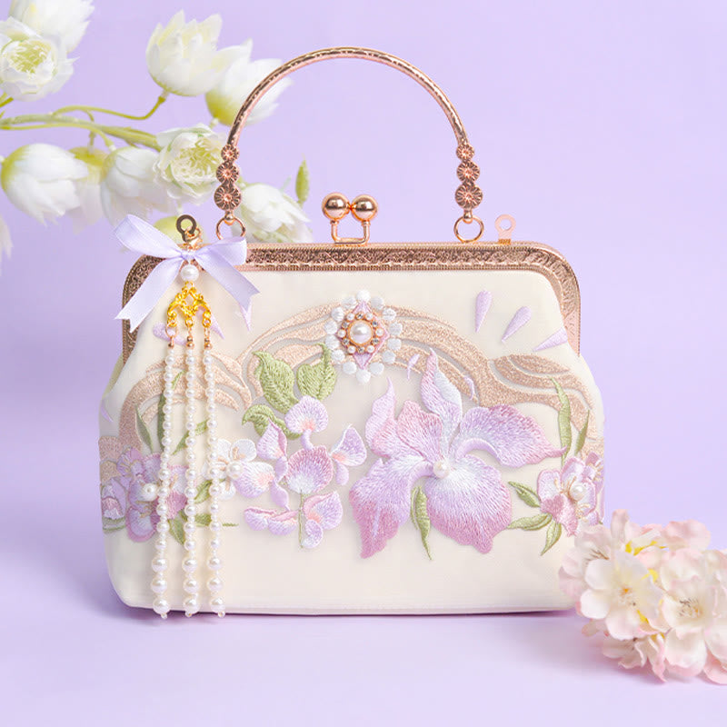 Sac à pompons brodé de fleurs violet clair pour l'énergie spirituelle