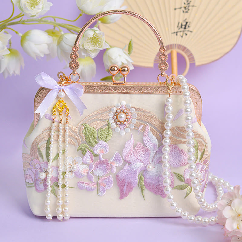 Sac à pompons brodé de fleurs violet clair pour l'énergie spirituelle