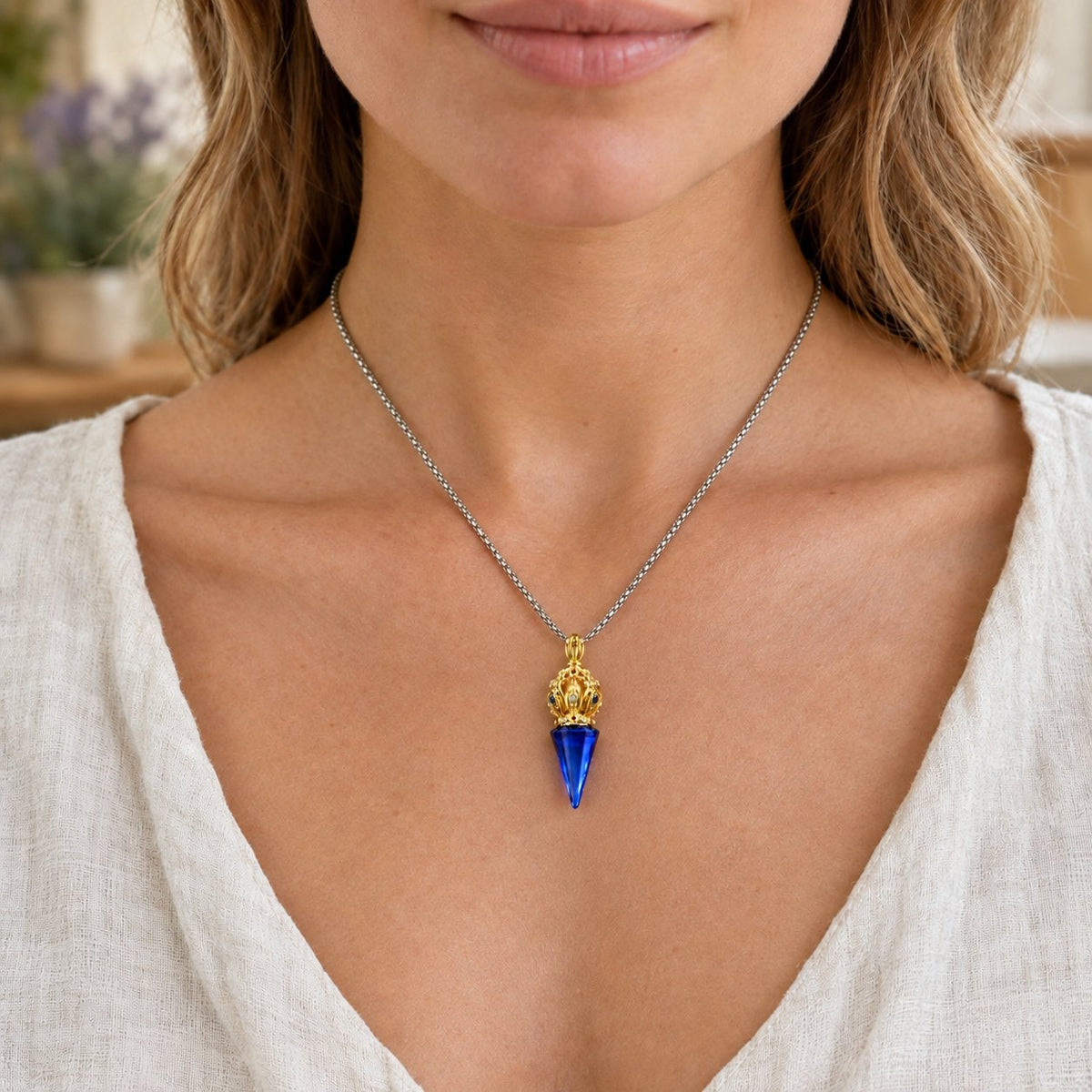 Liuli Crystal Dorje Vajra Spiritual Strength Necklace, worn on the neck by a woman