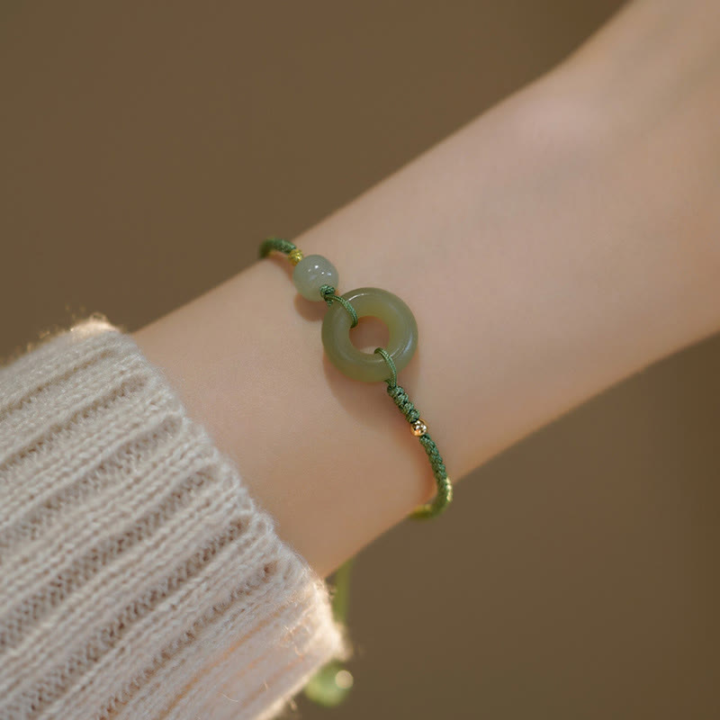 Bracelet à breloques en jade lotus et boucle de paix pour la prospérité