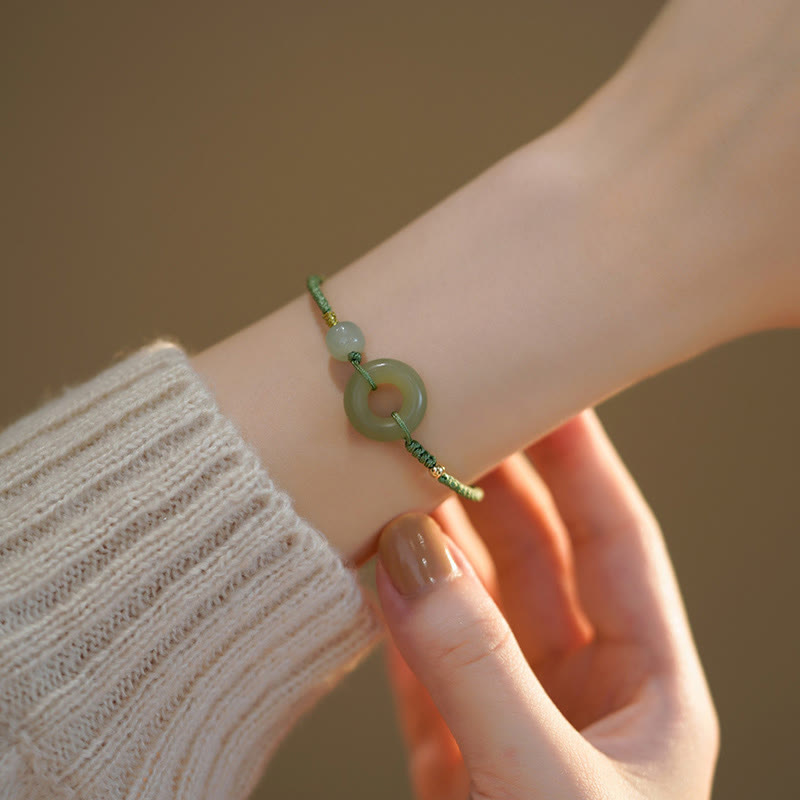 Bracelet à breloques en jade lotus et boucle de paix pour la prospérité