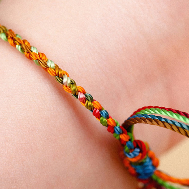 Bracelet porte-bonheur multicolore en fil rouge pour la protection et la chance