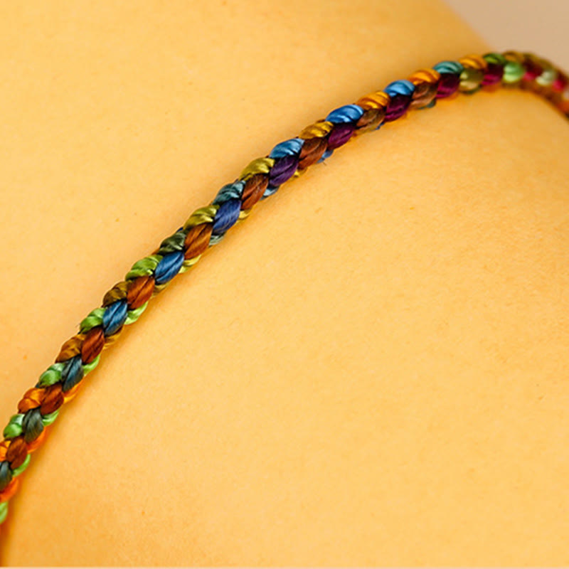 Bracelet porte-bonheur multicolore en fil rouge pour la protection et la chance