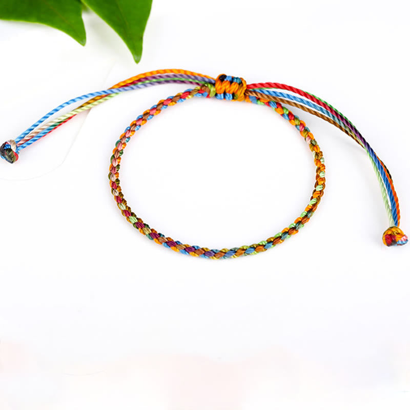 Bracelet porte-bonheur multicolore en fil rouge pour la protection et la chance