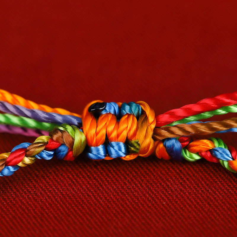 Bracelet porte-bonheur multicolore en fil rouge pour la protection et la chance