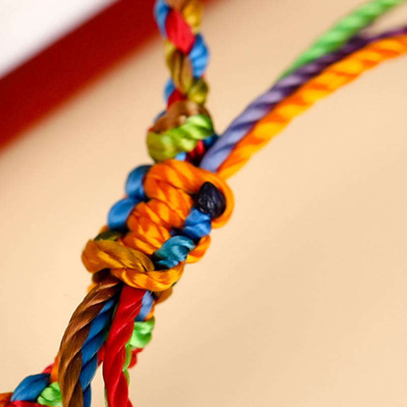 Bracelet porte-bonheur multicolore en fil rouge pour la protection et la chance
