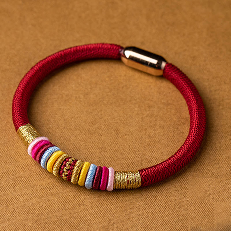 Bracelet de protection à boucle magnétique et cordon rouge avec nœud King Kong