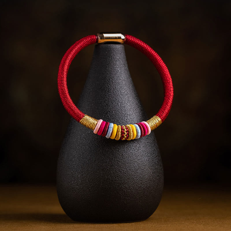 Bracelet de protection à boucle magnétique et cordon rouge avec nœud King Kong