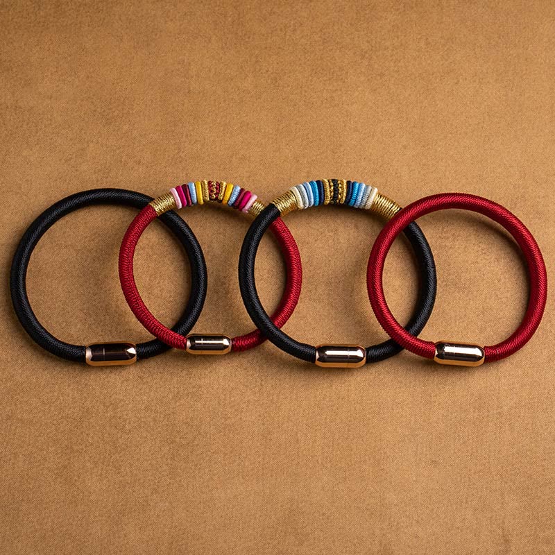 Bracelet de protection à boucle magnétique et cordon rouge avec nœud King Kong