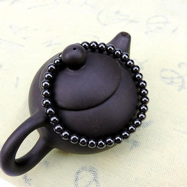 Bracelet en perles d'hématite magnétique pour l'équilibre
