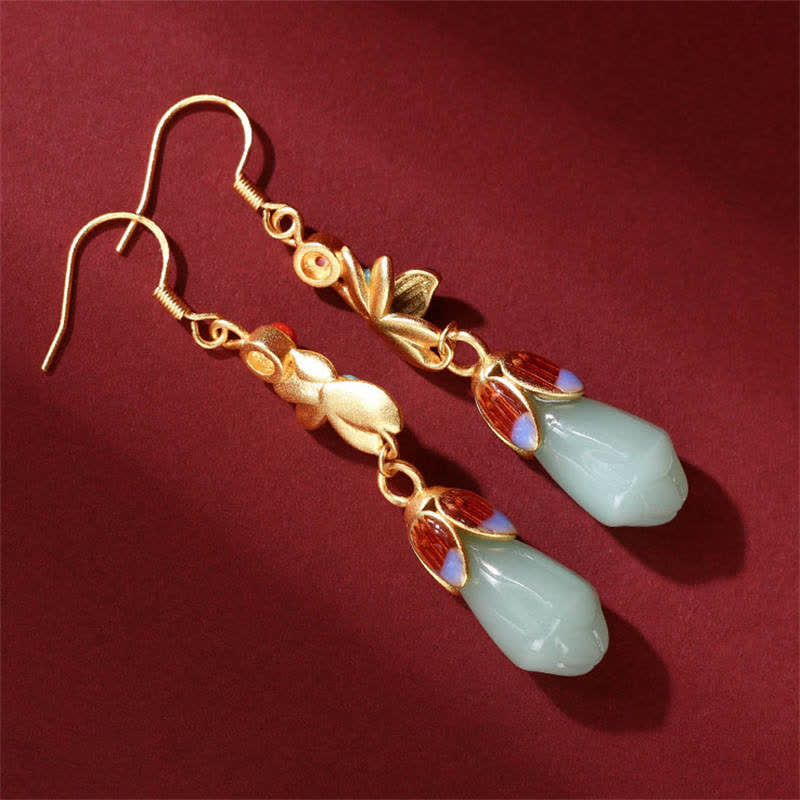 Boucles d'oreilles pendantes en jade et fleur de magnolia