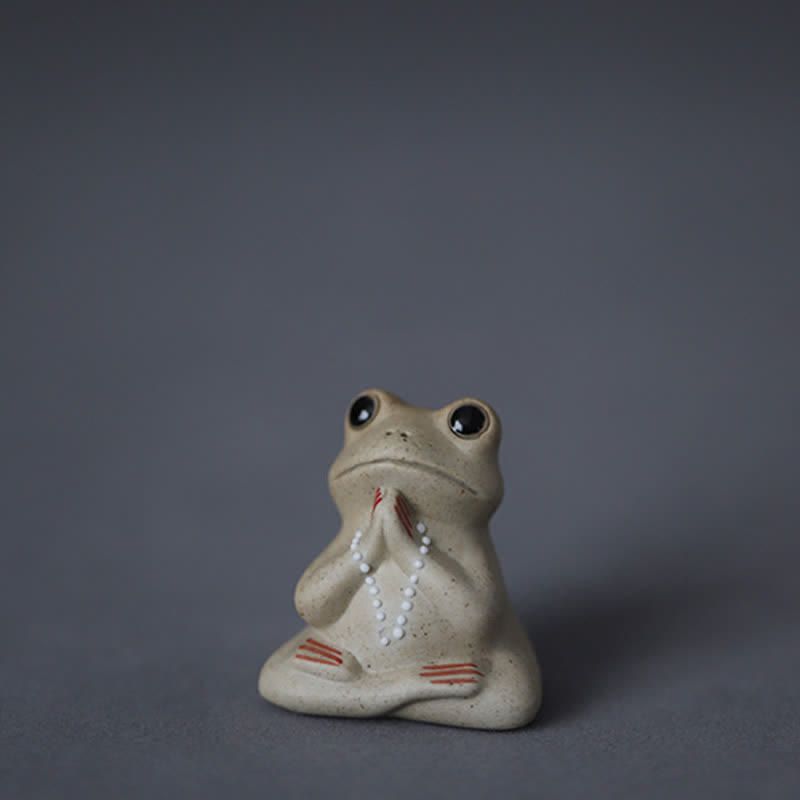 Statue de petite grenouille méditante en céramique pour une décoration zen et calme