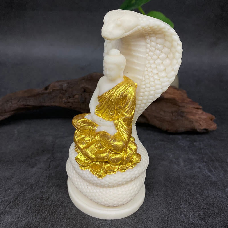 Statue de Bouddha en ivoire de taille moyenne avec symbole de sérénité du lotus serpent