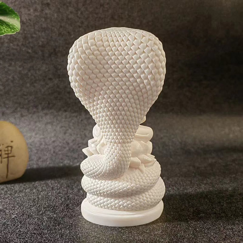 Statue de Bouddha en ivoire de taille moyenne avec symbole de sérénité du lotus serpent