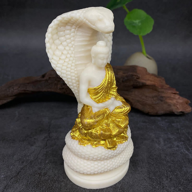 Statue de Bouddha en ivoire de taille moyenne avec symbole de sérénité du lotus serpent