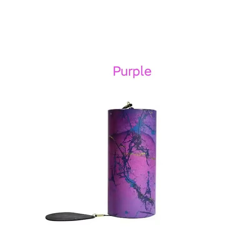 Purple cylindrical candle with blue marbled patterns for Metal Koshi Wind Chimes