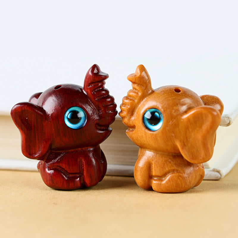 Mini éléphant sculpté en bois de santal pour la protection et la chance