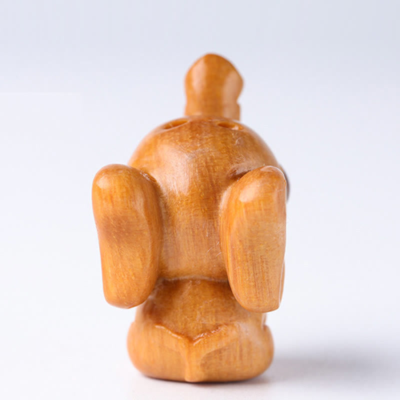 Mini éléphant sculpté en bois de santal pour la protection et la chance